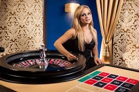 rezekitoto login platform interface showing sportsbook, live tables, and slot games